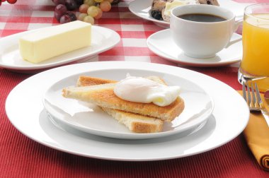 Poached egg breakfast on toast with coffee clipart