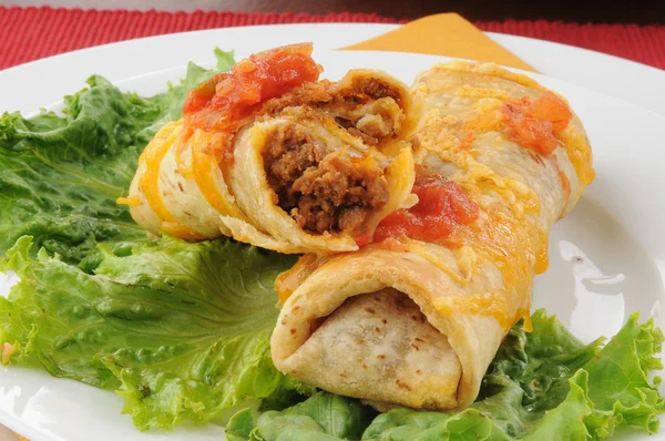 Closeup of beef and bean chimichangas — Stock Photo, Image