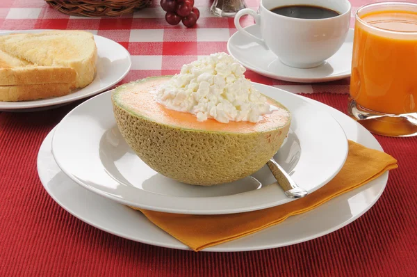 Cantaloupe with toast and coffee — Stock Photo, Image