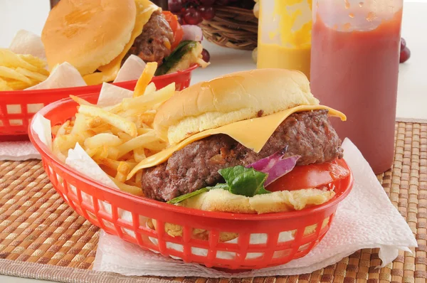 Cheeseburger in a basket — Stock Photo, Image