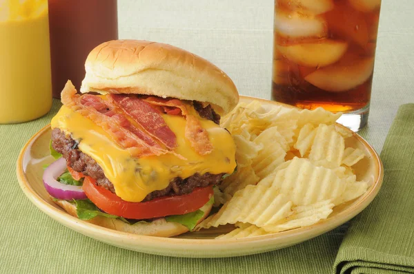 Bacon cheeseburger with a soft drink — Stock Photo, Image
