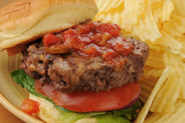 Thick hamburger with salsa — Stock Photo, Image