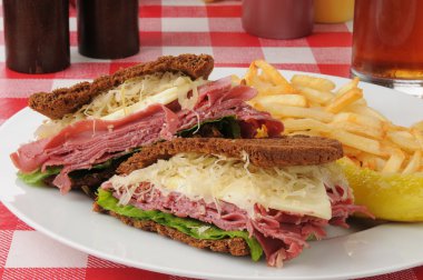 Reuben sandwich on dark rye clipart