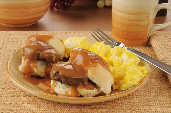 Sausage and biscuits with scrambled eggs — Stock Photo, Image