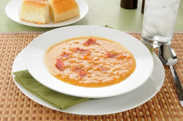 Bean soup with dinner rolls — Stock Photo, Image