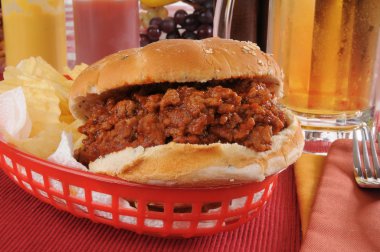 Sloppy Joe with a mug of beer clipart