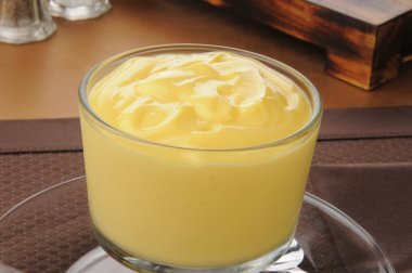 Dessert cup of vanilla pudding clipart
