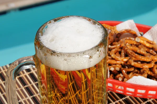 stock image Beer and pretzels by the pool