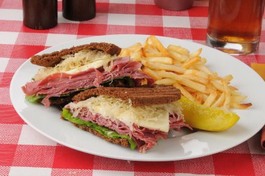 Reuben sandwich with fries clipart