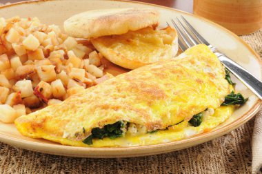 Spinach and feta cheese omelet clipart