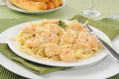 Shrimp scampie with breadsticks clipart