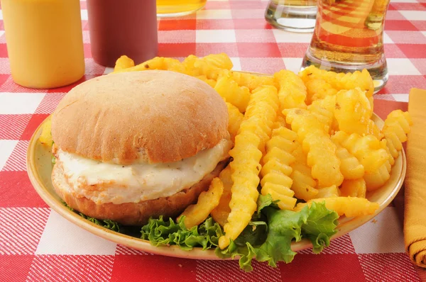 Chicken burger with fries and beer — Stock Photo, Image