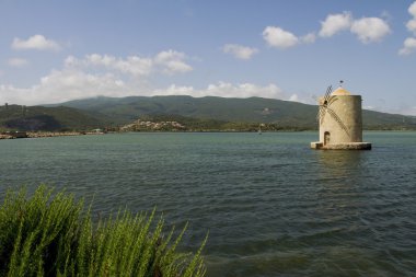 Orbetello lagoon windmill, Tuscany italy clipart