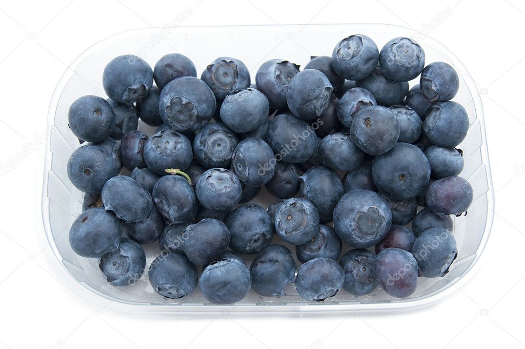 Bowl with fresh blueberries on white background