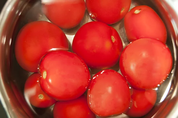 stock image Wet cherry tomatoes for gazpacho in silver pan