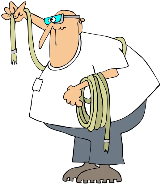 Человек держит катушку веревки — стоковое фото
