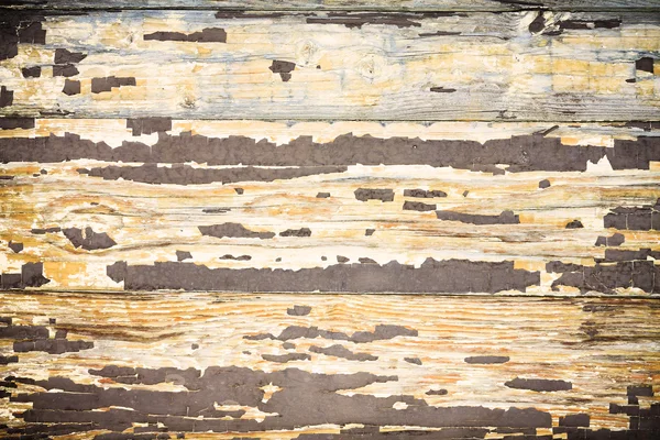 Närbild av en peeling trädörr i grunge — Stockfoto