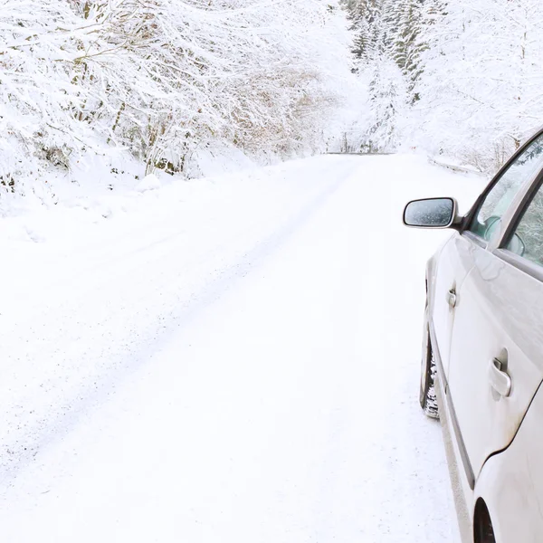 stock image Car on snowy winter road