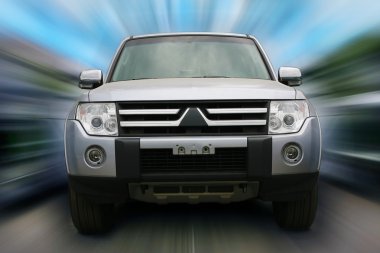 Silvery off-road car fast movement clipart