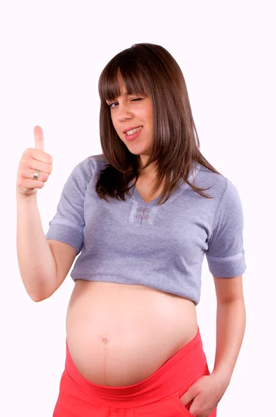 Беременная женщина показывает окей знак — стоковое фото