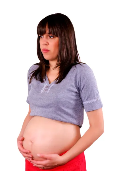 Femme enceinte inquiète — Photo