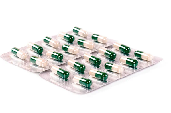 stock image Green and white capsulas