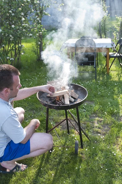 stock image Man preparing barbecue