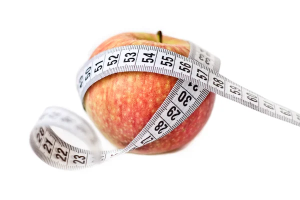 stock image Red apple and measuring tape