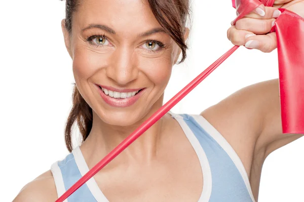 Woman with red rubber band — Stock Photo, Image
