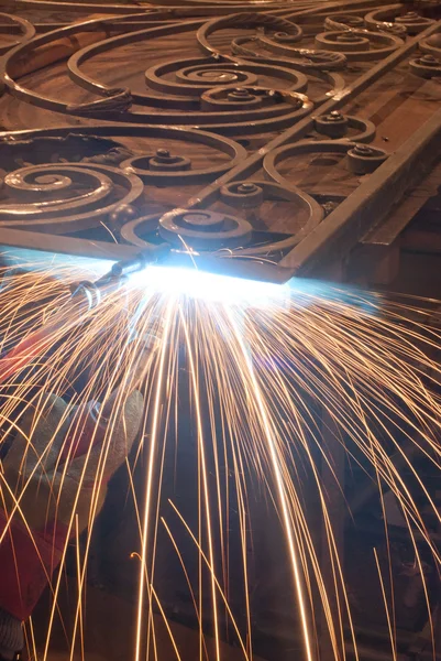 stock image Worker welding metal. Production and construction