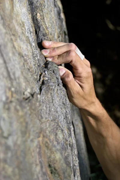 stock image Man climbing on granite