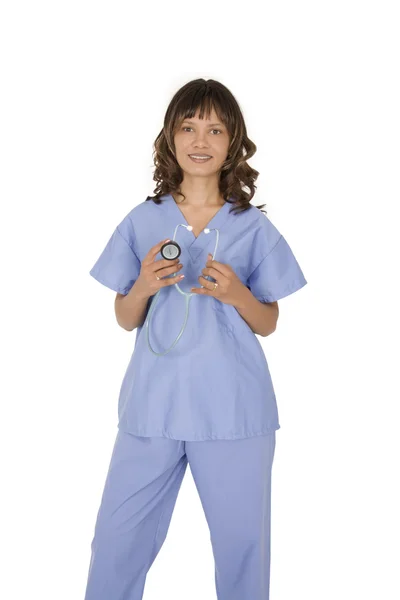 Médico o enfermera afroamericana que usa un fregadero con un estetoscopio aislado sobre un fondo blanco —  Fotos de Stock