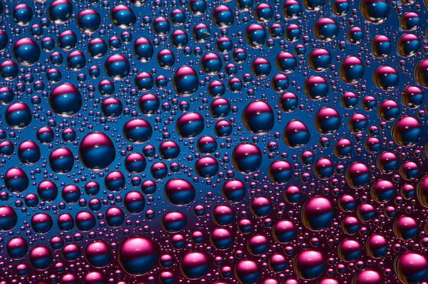 stock image Blue and pink water drops