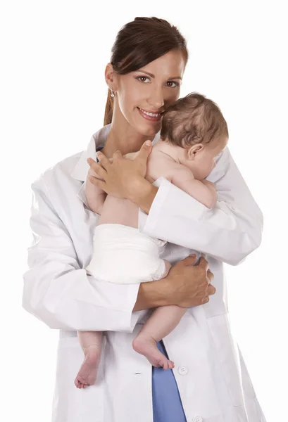 Жінка-лікар і дитина — стокове фото