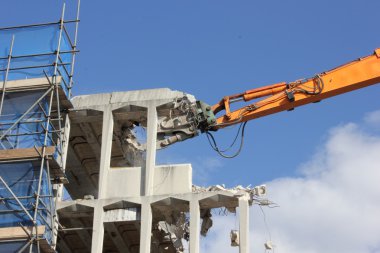 Demolishing of a building clipart