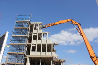 Demolishing of a building clipart