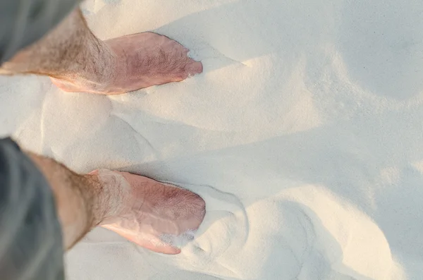 insan ayakları altında kum