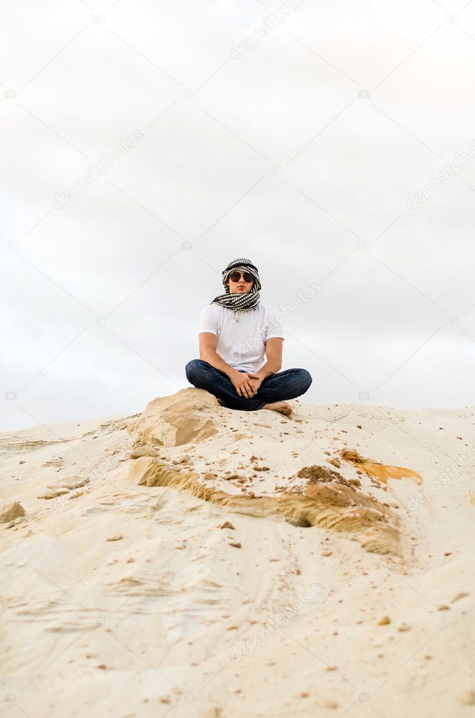 Young man in desert