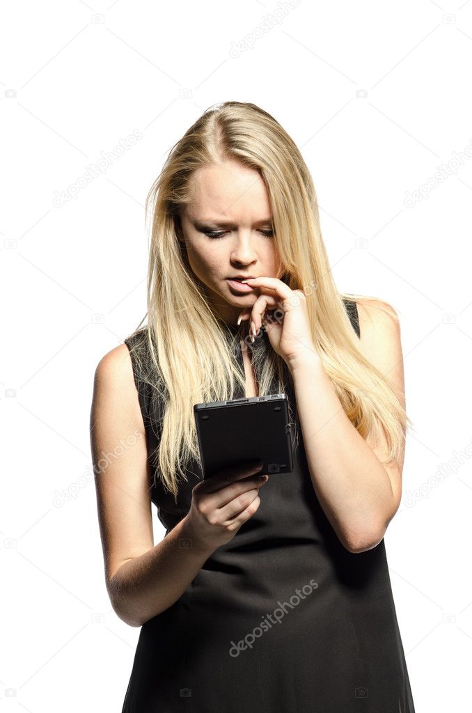 Woman in black reads e-reader