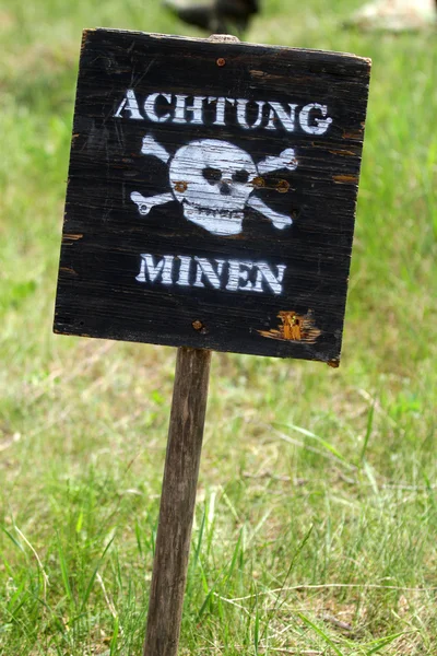 Inscription on a sign "Attention, mines!" in German — Stock Photo, Image