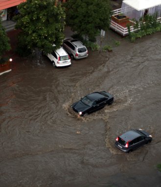 The flood inundated a street in Odessa clipart
