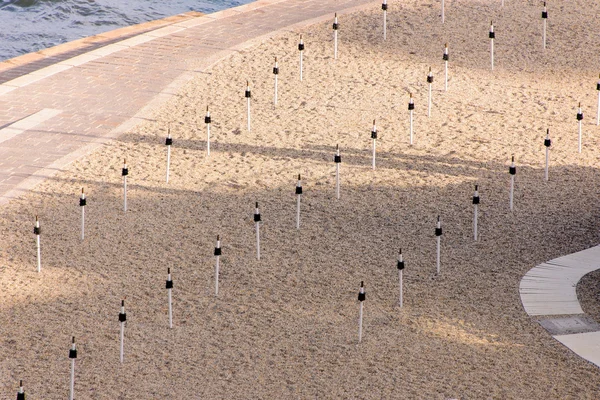 stock image Umbrellas sticks on the beach