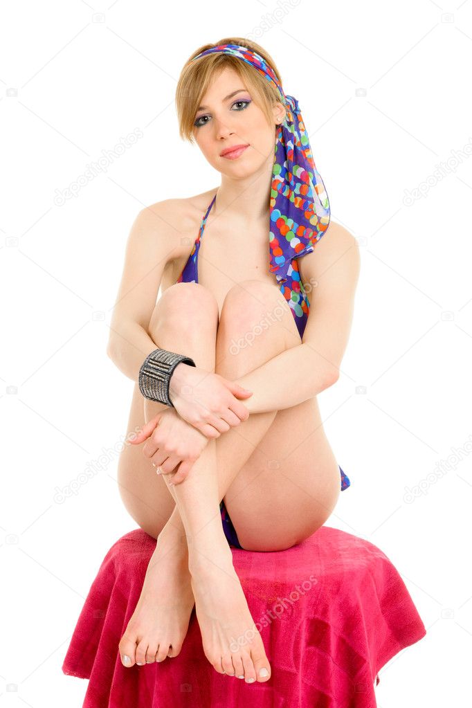 Young woman relaxing on beach chair