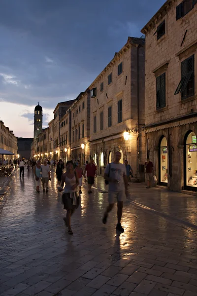 stock image Old street and cafes at night in Dubrovnik