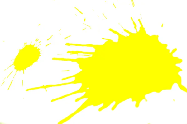 Yellow splashes on a white background. — Stock Photo, Image