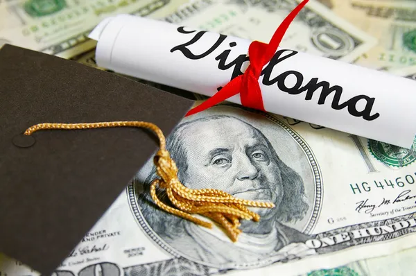 Cap and diploma — Stock Photo, Image