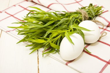 Two eggs and herb tarragon