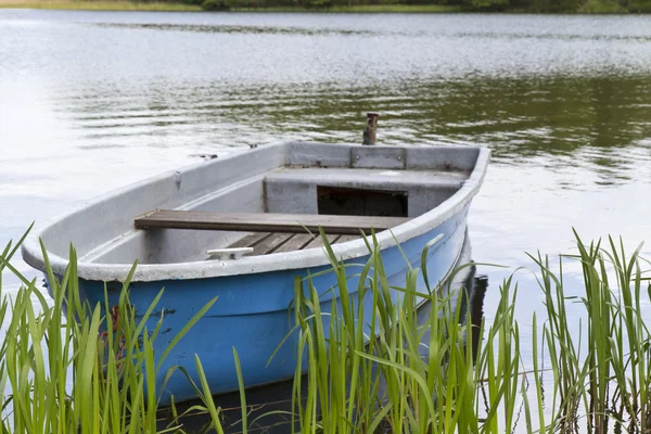 stock image Old Rowboat on a lake in East Germany