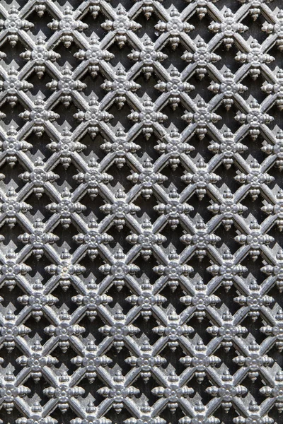 Металлический орнамент в качестве фона — стоковое фото
