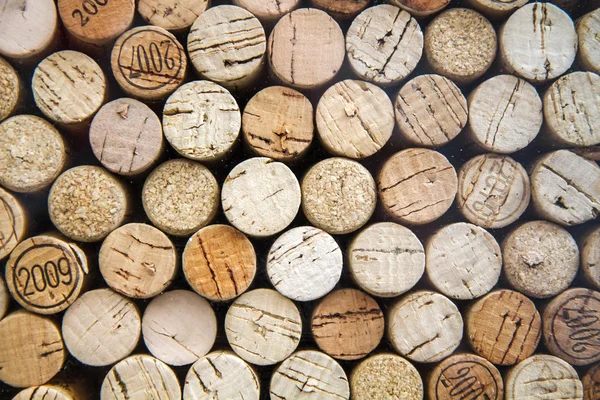 Vzorek láhev na víno zátky jako pozadí — Stock fotografie